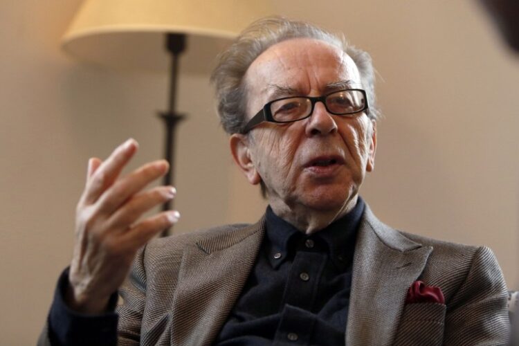 TO GO WITH STORY BY LAURENT LOZANO
Albanian novelist Ismail Kadare gestures during an interview with AFP on February 8, 2015 in Jerusalem. Born in 1936 in the Albanian mountain town of Girokaster, Kadare has won a number of prestigious prizes including the first international Man Booker Prize in 2005.  AFP PHOTO/ GALI TIBBON