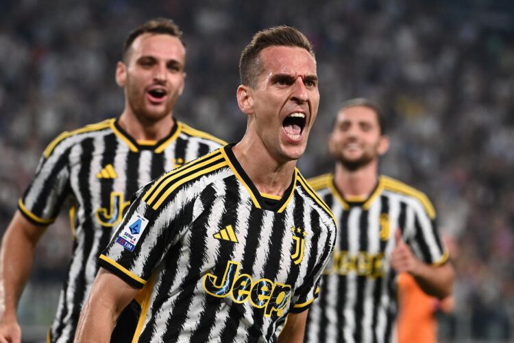 TOPSHOT - Juventus' Polish forward #14 Arkadiusz Milik celebrates after scoring during the Italian Serie A football match Juventus vs Torino, at Allianz stadium in Turin, on October 7, 2023. (Photo by Isabella BONOTTO / AFP) (Photo by ISABELLA BONOTTO/AFP via Getty Images)