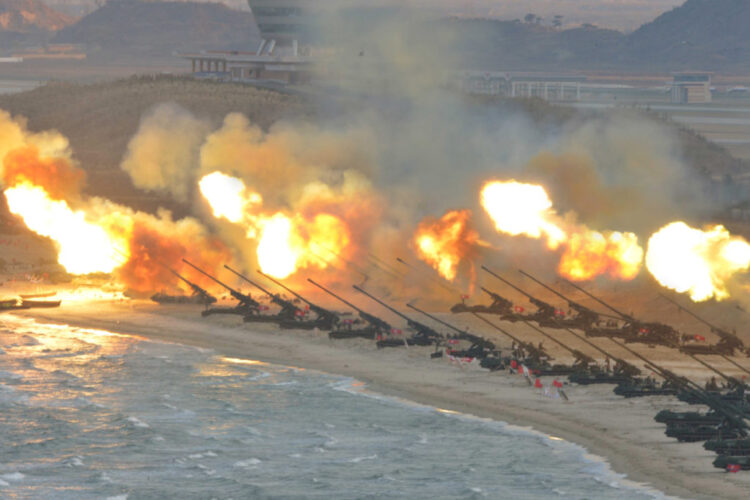 Artillery pieces are seen being fired during a military drill at an unknown location, in this undated photo released by North Korea's Korean Central News Agency (KCNA) on March 25, 2016. REUTERS/KCNA/File Photo  ATTENTION EDITORS - THIS PICTURE WAS PROVIDED BY A THIRD PARTY. REUTERS IS UNABLE TO INDEPENDENTLY VERIFY THE AUTHENTICITY, CONTENT, LOCATION OR DATE OF THIS IMAGE. FOR EDITORIAL USE ONLY. NOT FOR SALE FOR MARKETING OR ADVERTISING CAMPAIGNS. THIS PICTURE IS DISTRIBUTED EXACTLY AS RECEIVED BY REUTERS, AS A SERVICE TO CLIENTS. NO THIRD PARTY SALES. SOUTH KOREA OUT. NO COMMERCIAL OR EDITORIAL SALES IN SOUTH KOREA