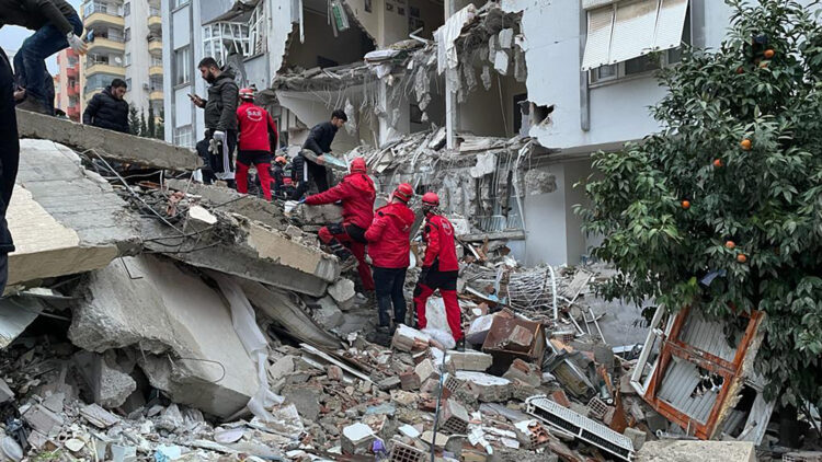 KAHRAMANMARAS, TURKIYE - FEBRUARY 06: A view of debris as rescue workers conduct search and rescue operations after the 7.4 magnitude earthquake hits Kahramanmaras, Turkiye on February 06, 2023. (Photo by Eren Bozkurt/Anadolu Agency via Getty Images)

Rescue workers search through debris in Kahramanmaras, Turkey on Monday. (Eren Bozkurt/Anadolu Agency/Getty Images)