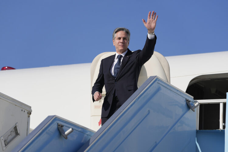 U.S. Secretary of State Antony Blinken waves as he boards his plane at an airport in Tel Aviv, Israel, Thursday, Feb. 8, 2024. (AP Photo/Mark Schiefelbein, Pool)