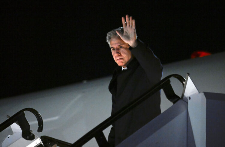 U.S. Secretary of State Antony Blinken waves upon arrival at the airport in Munich ahead the 60th Munich Security Conference (MSC) in Munich, Germany, Thursday, Feb. 15, 2024. (Thomas Kienzle/Pool via AP)